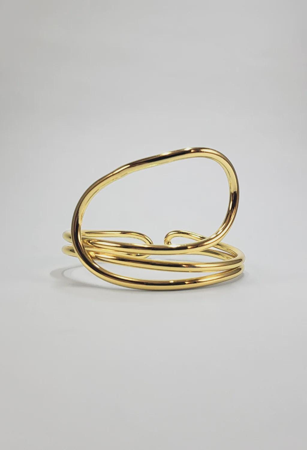 Spiral Flow Gold Cuff Bracelet
