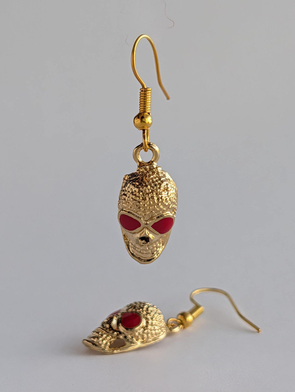 Gold Skull Dangle Earrings